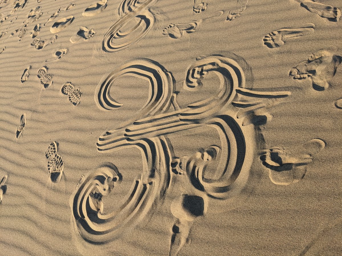 Sand drawing on the Singing Dune surface — Altyn-Emel