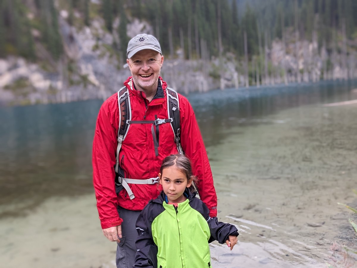 Father and daughter at Kaindy Lake — private guided tour from Almaty