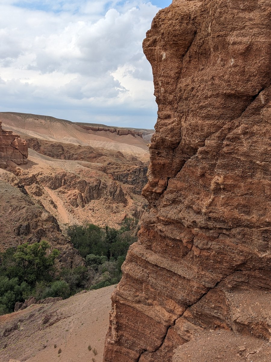 Temirlik Canyon overlook with red rock detail — Arna Jol signature journey