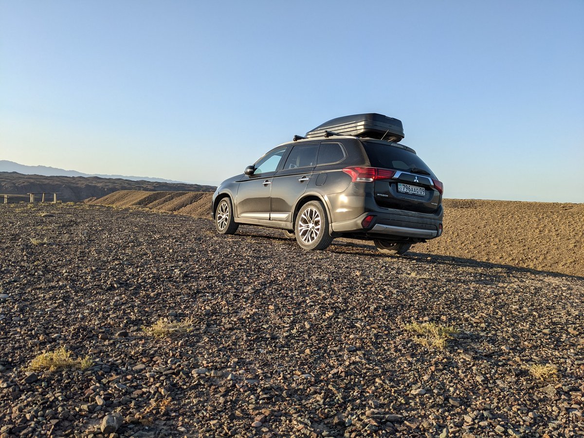 Arna Jol private 4×4 transport at sunset on the way to Temirlik Canyon campsite